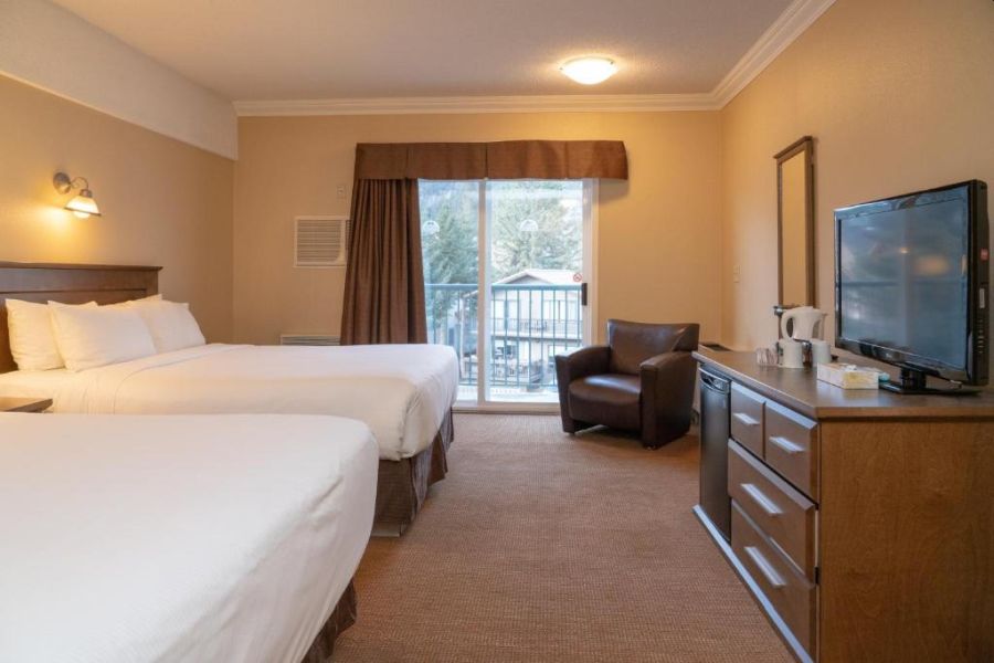 Standaard kamer van Irwins Mountain Inn in Banff tijdens een wintersportreis naar Canada