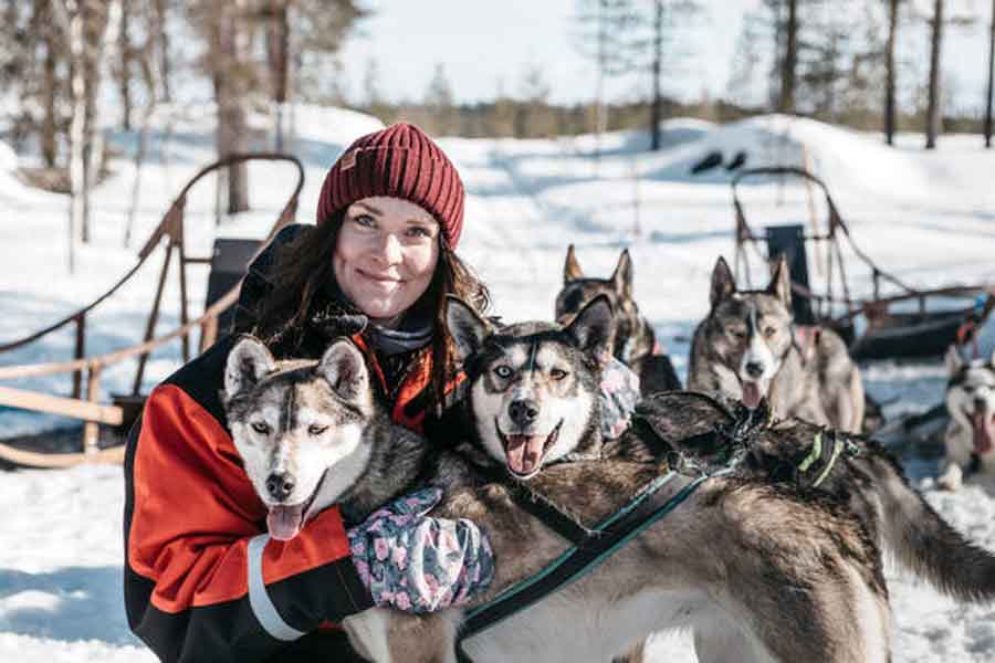 Samen met het huskyteam Saariselka