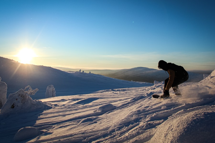 Snowboarder op de piste