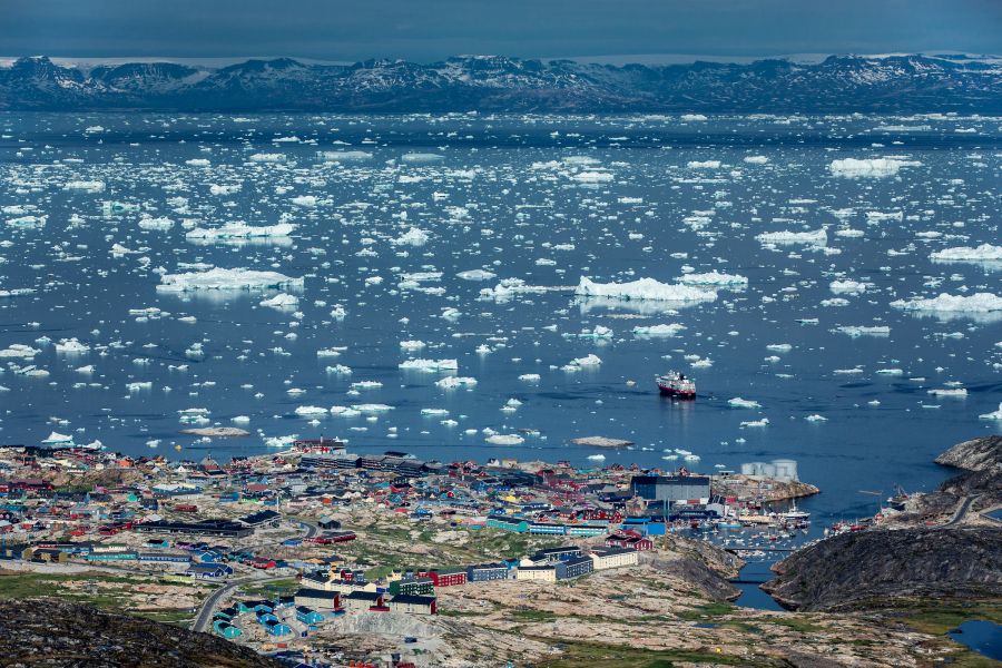 Ilulissat with MS Fram in the ice filled bay on an Air Zafari flight in Greenland