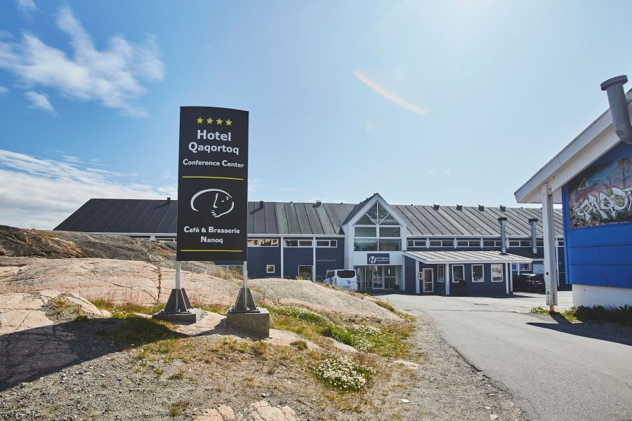 Entrance to Hotel Qaqortoq and Caf? Nanoq on a sunny day