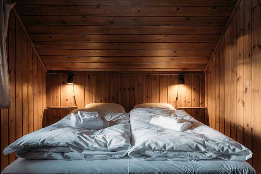 Slaapkamer met een tweepersoonsbed in Kvitåvatn Fjellhytter
