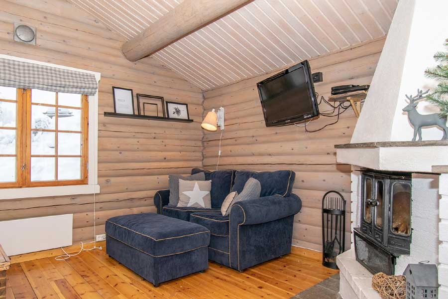 Woonkamer met open haard Fagerasen Chalet Trysil Noorwegen
