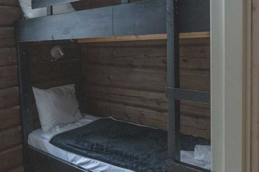 Slaapkamer met stapelbed in Tømmerhytta Skåret