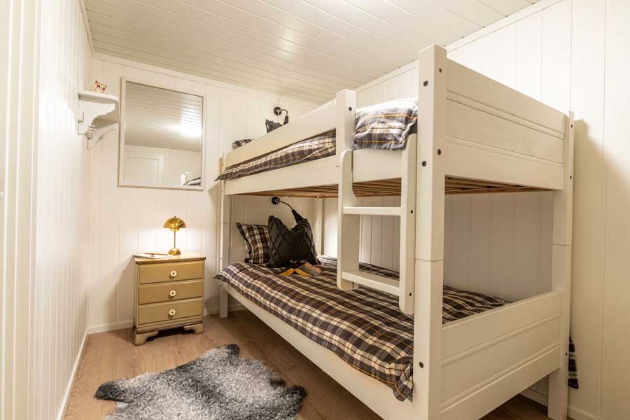 Slaapkamer twee met een stapelbed