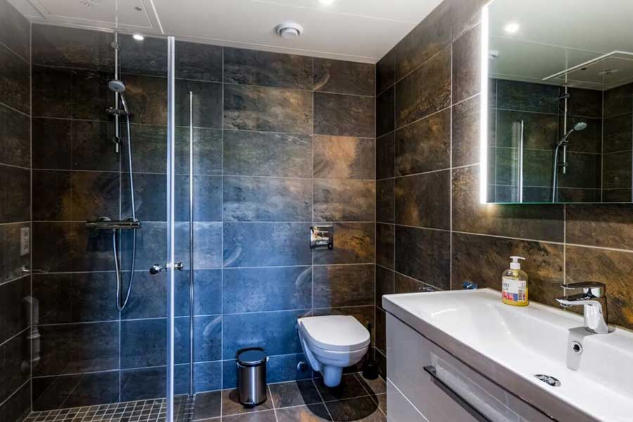 Badkamer in de slaapkamer van een appartement van Trysil Alpine Lodge