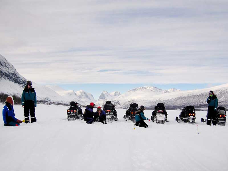 Sneeuwscooteren in Kiruna