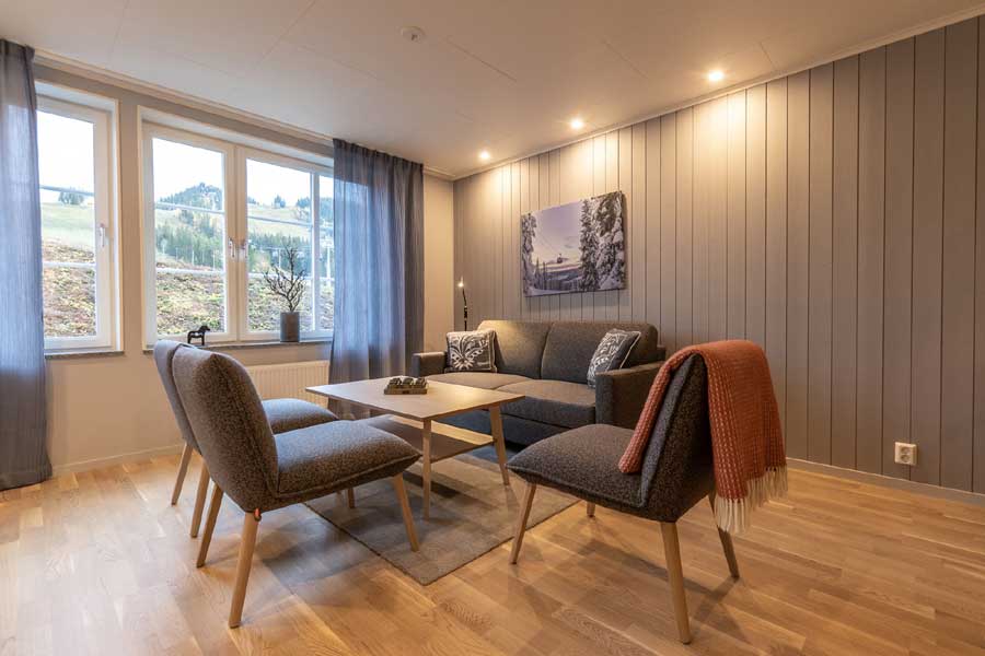 Zithoek van een appartement in Hotel Kurbits, Kläppen