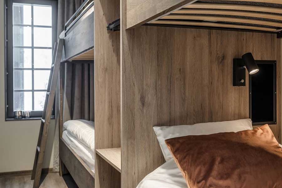 Slaapkamer met twee stapelbedden in Skistar Lodge Hundfjället