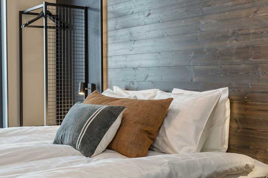 Slaapkamer met een tweepersoonsbed in Skistar Lodge Hundfjället