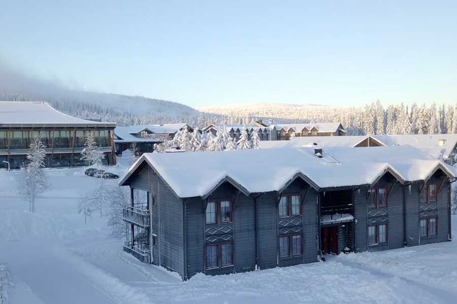 Ski Lodge Village appartementen met de pistes van Lindvallen op de achtergrond