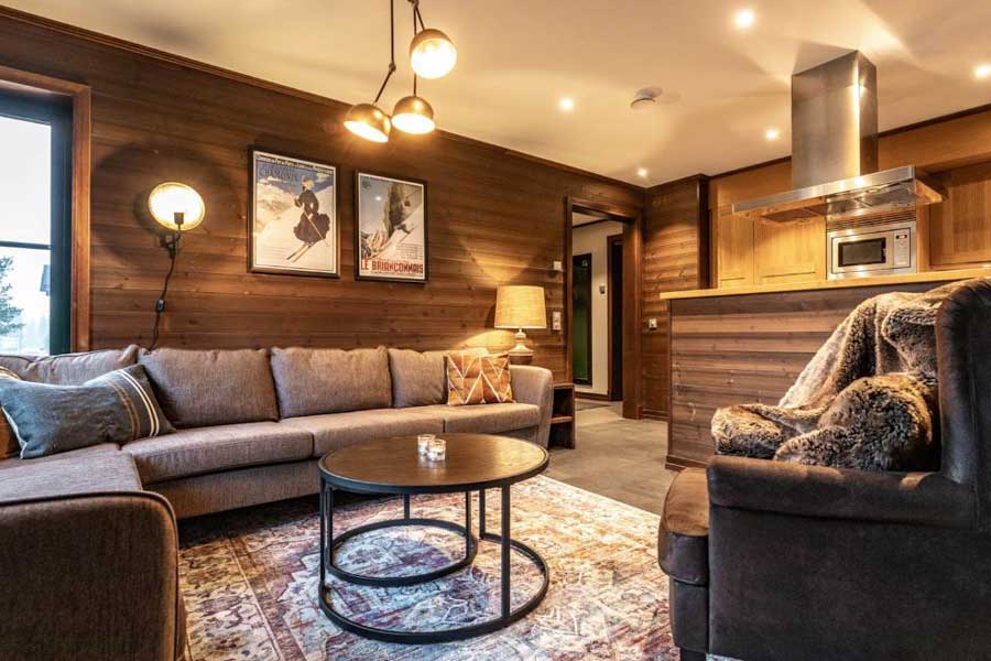 Woonkamer in een Ski Lodge Village appartement