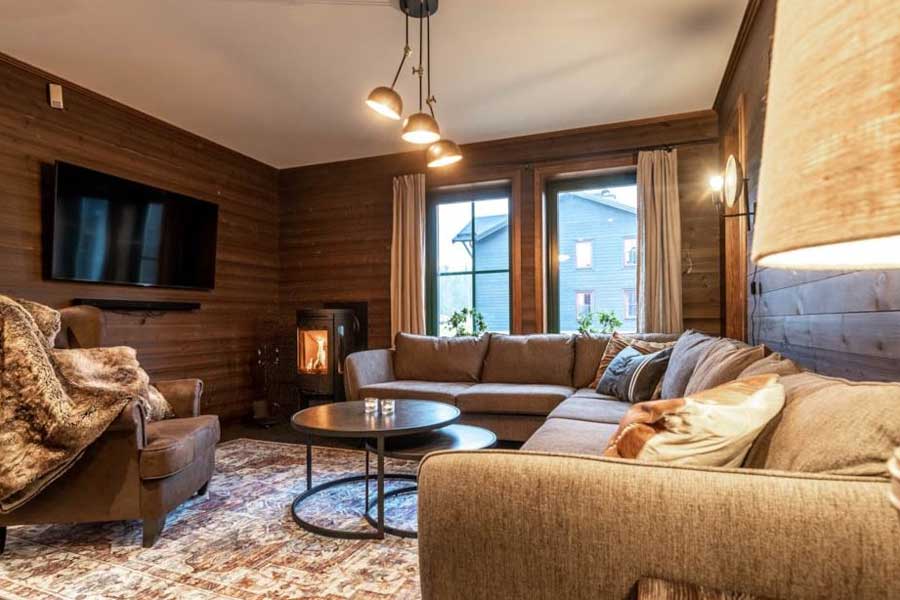 Woonkamer in een Ski Lodge Village appartement