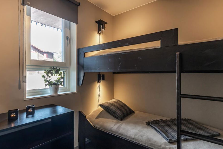 Slaapkamer met stapelbed in Solbacken View